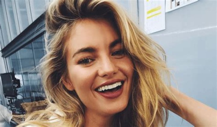 Australian Stunner Elyse Taylor in Swimsuit Loves "Footy Shorts Forever"