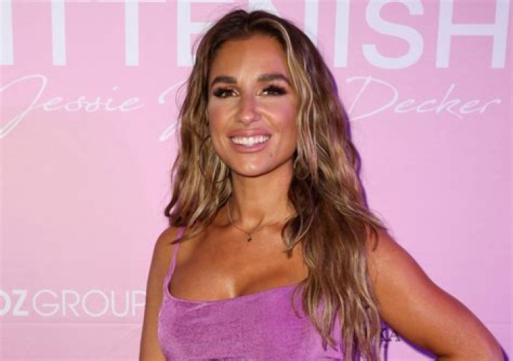 Jessie James Decker in Bathing Suit "Can Doggy Paddle" — Celebwell